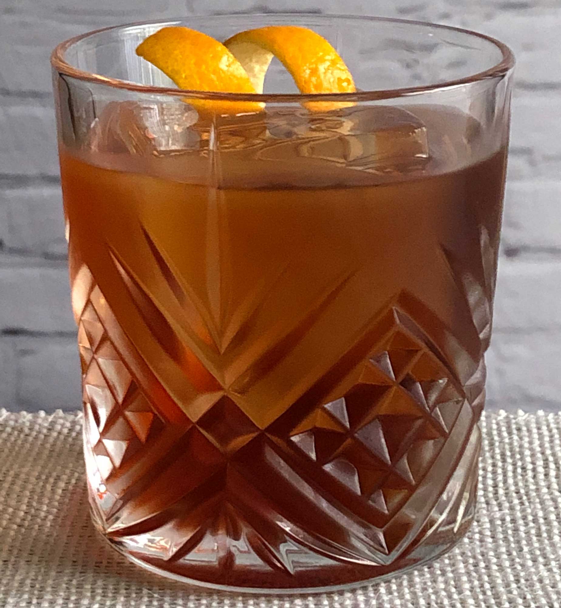 An example of the Petit Boulevardier, the mixed drink (cocktail) featuring Cardamaro Vino Amaro, Dolin Rouge Vermouth de Chambéry, and Aperitivo Cappelletti; photo by Lee Edwards