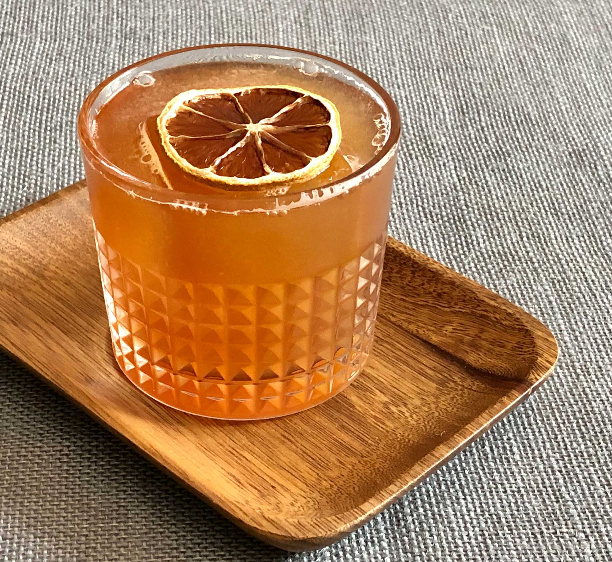 An example of the Blackheart, the mixed drink (cocktail), by Brick & Mortar, Cambridge, MA, featuring amber ale, Batavia Arrack van Oosten, St. Elizabeth Allspice Dram, molasses or syrup or simple syrup, orange juice, lime juice, and Angostura bitters; photo by Lee Edwards
