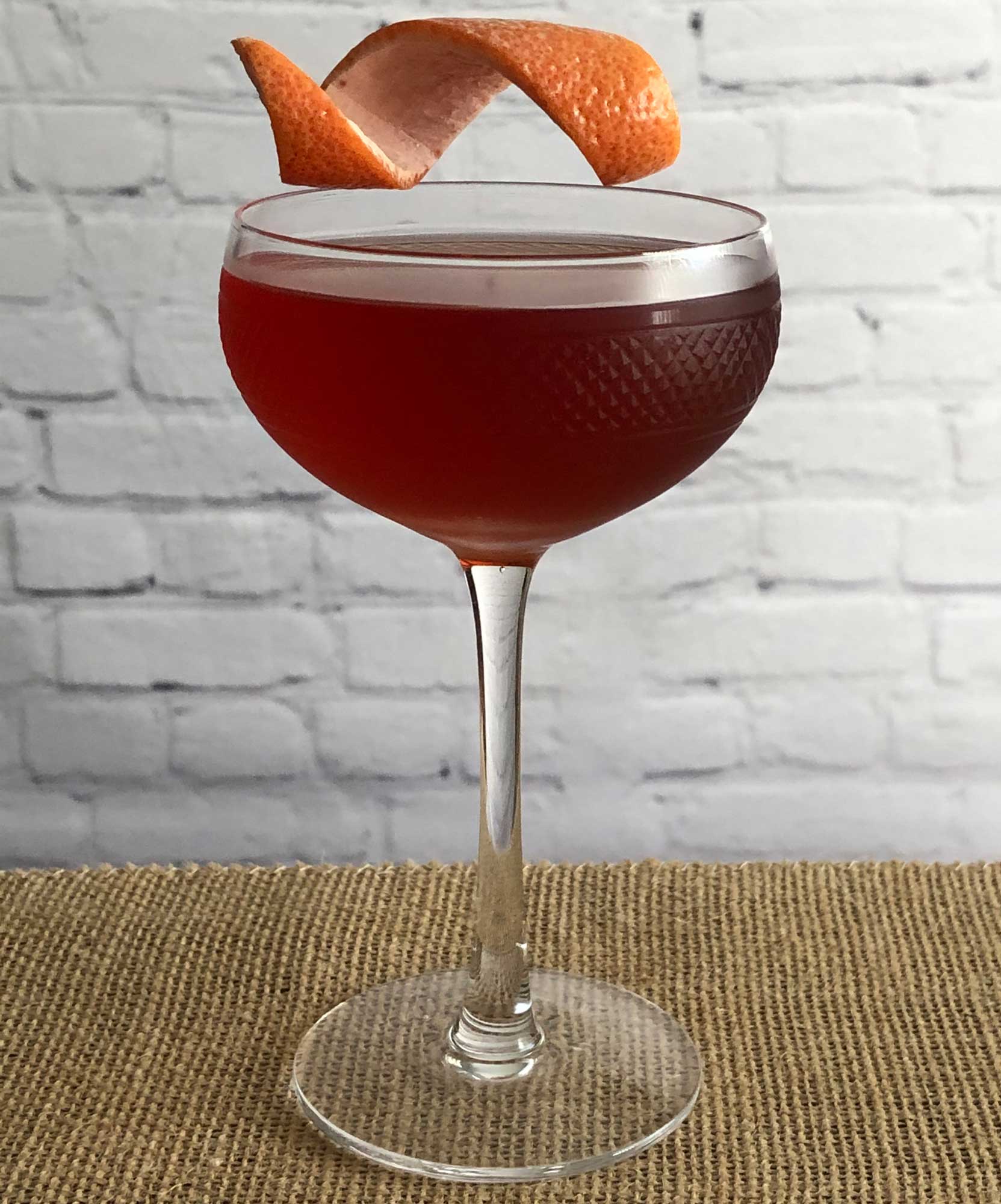 An example of the Bobby Byrrhns, the mixed drink (cocktail) featuring scotch whisky, Byrrh Grand Quinquina, Bénédictine, orange bitters, and Angostura bitters; photo by Lee Edwards