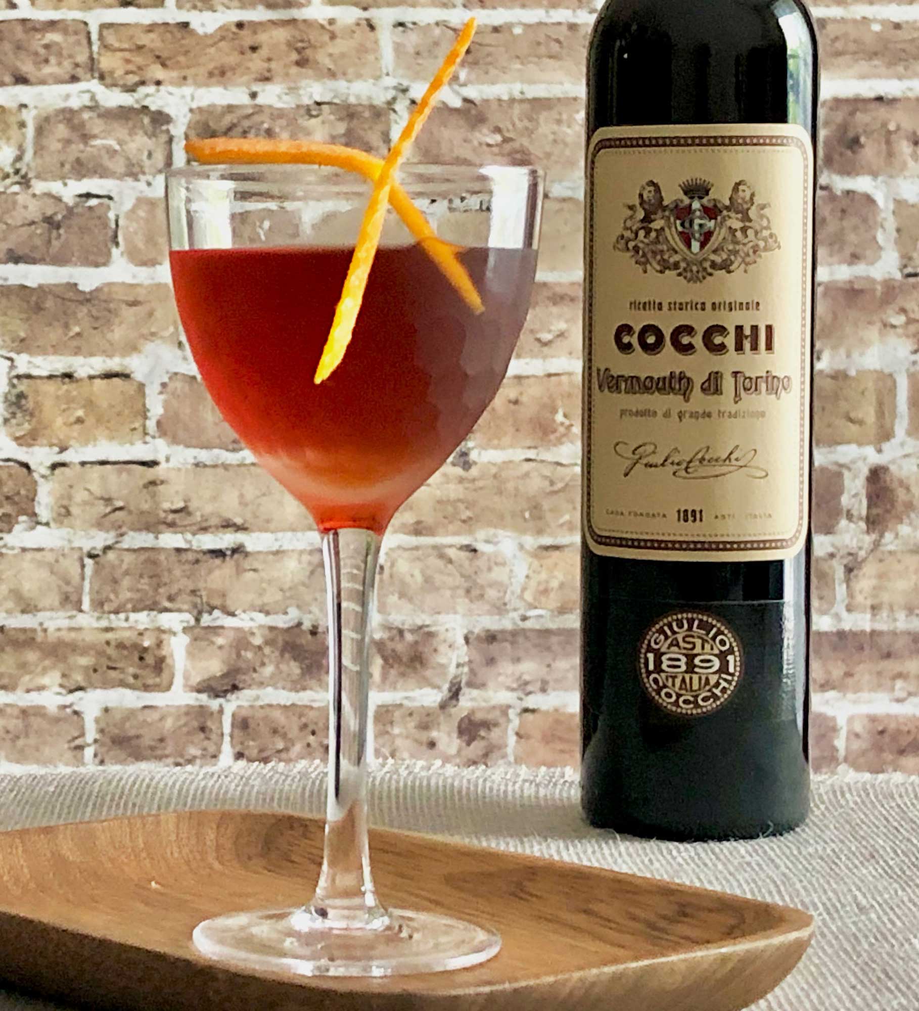 An example of the Golden Grove, the mixed drink (cocktail) featuring Cocchi Vermouth di Torino, Smith & Cross Traditional Jamaica Rum, maraschino liqueur, and orange bitters; photo by Lee Edwards