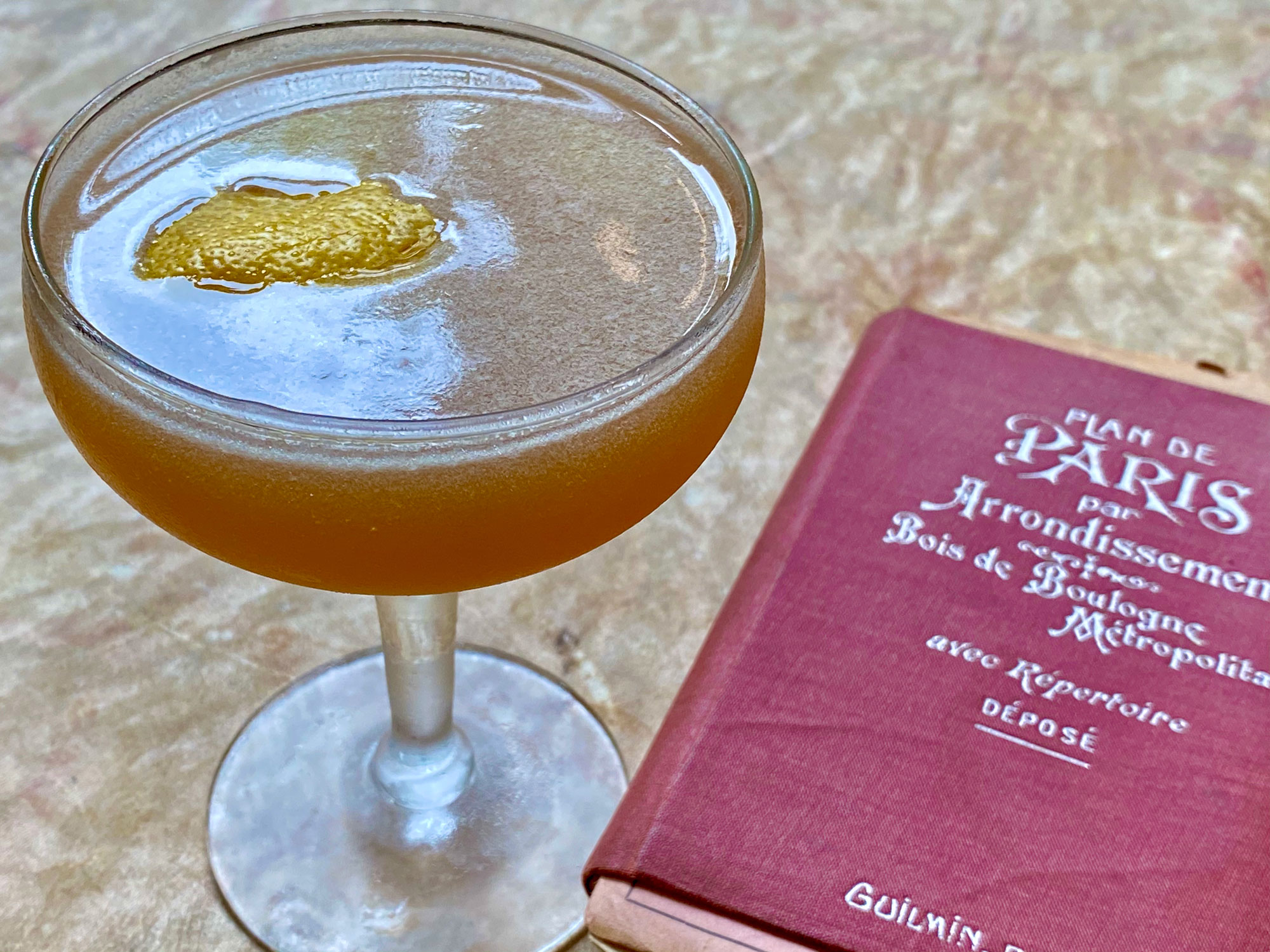 An example of the Champs Elysees, the mixed drink (cocktail), adapted from a drink in the Savoy Cocktail Book, featuring grape brandy, Dolin Génépy le Chamois Liqueur, lemon juice, simple syrup, and Angostura bitters; photo by Martin Doudoroff
