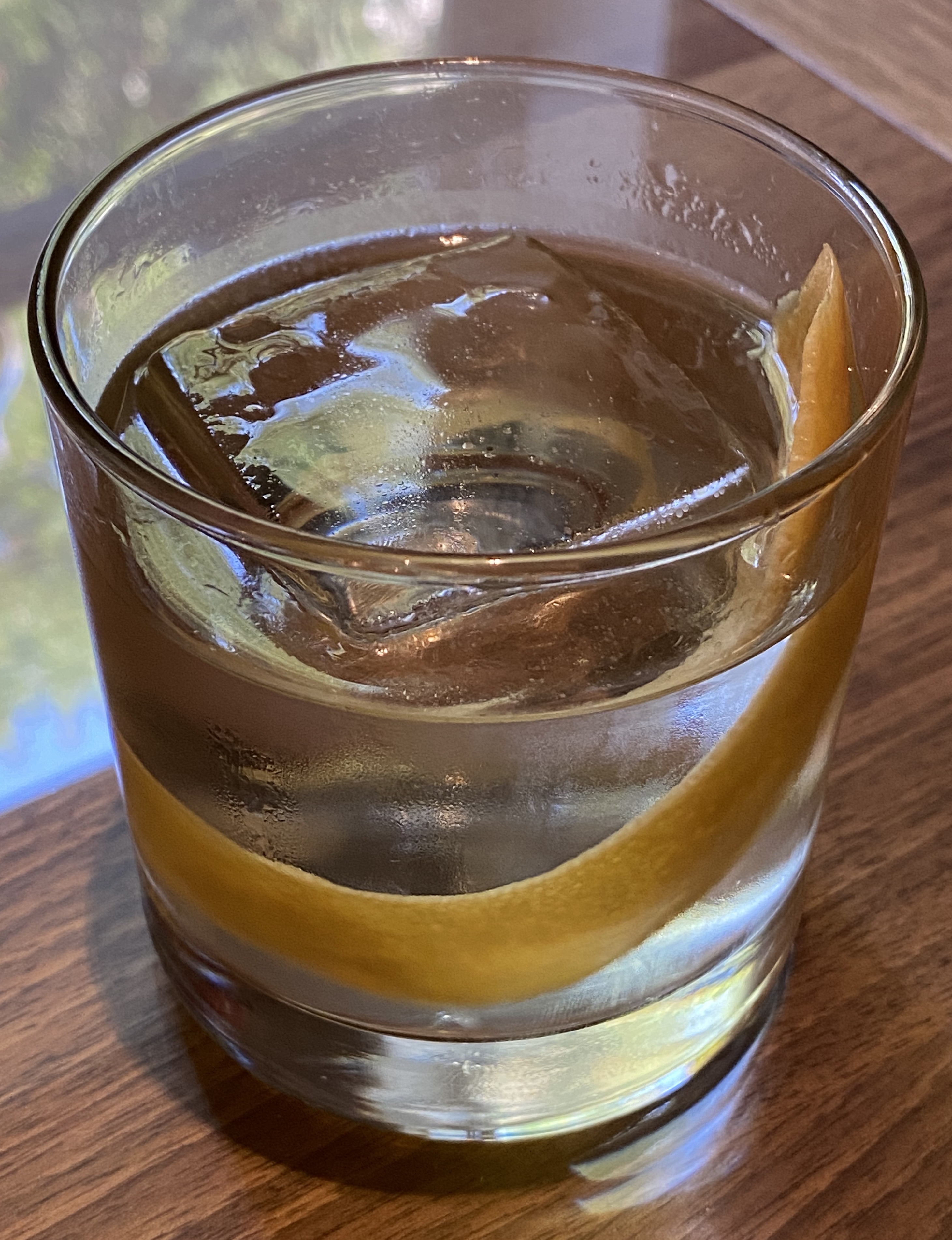 An example of the Blond Negroni, the mixed drink (cocktail) featuring Hayman’s London Dry Gin, Dolin Blanc Vermouth de Chambéry, and Salers Gentian Apéritif; photo by Martin Doudoroff