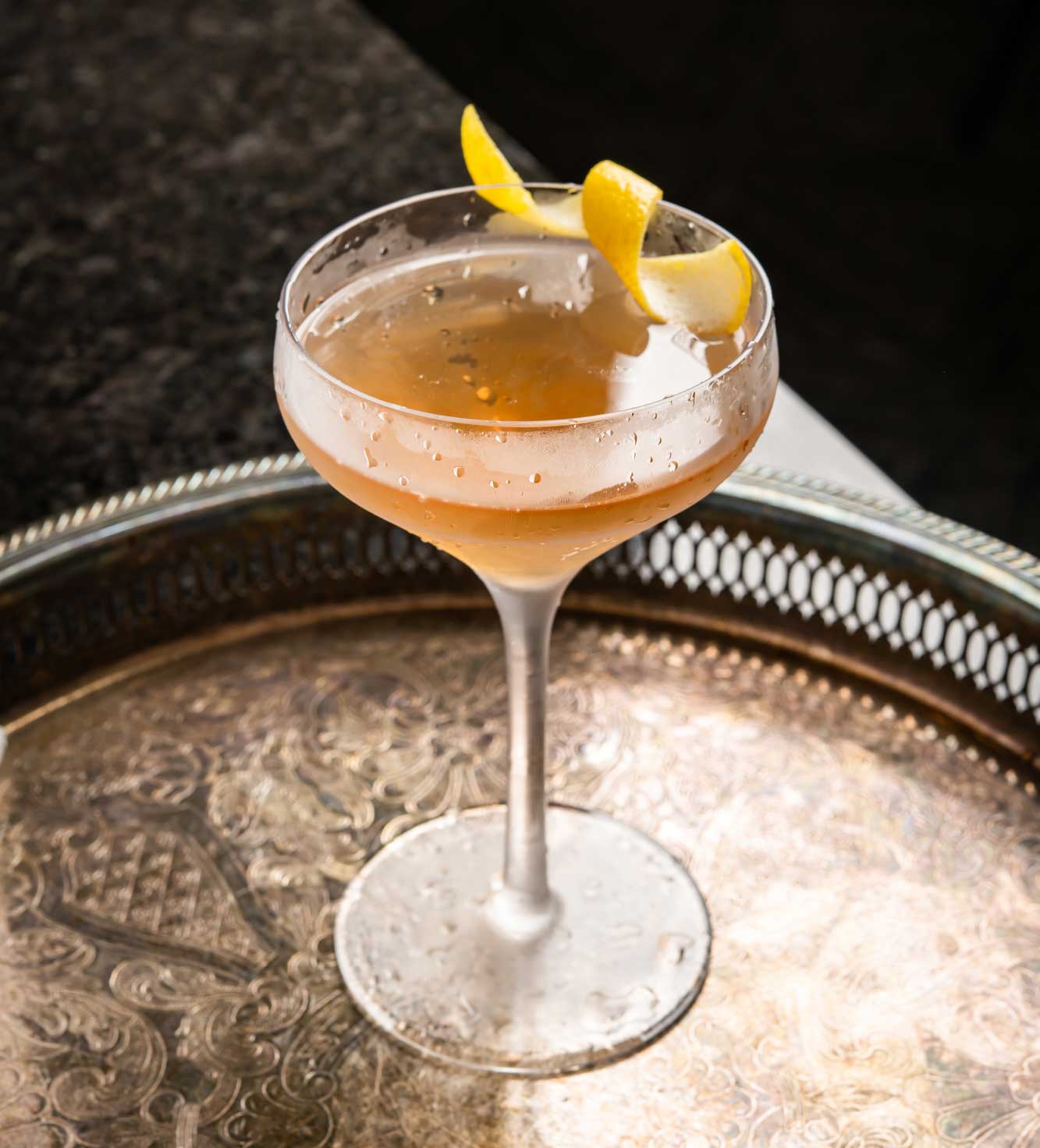 An example of the El Presidente, the mixed drink (cocktail) featuring light rum, Comoz Blanc Vermouth de Chambèry or Dolin Blanc Vermouth de Chambéry, curaçao, and grenadine; photo by Jose Pereiro