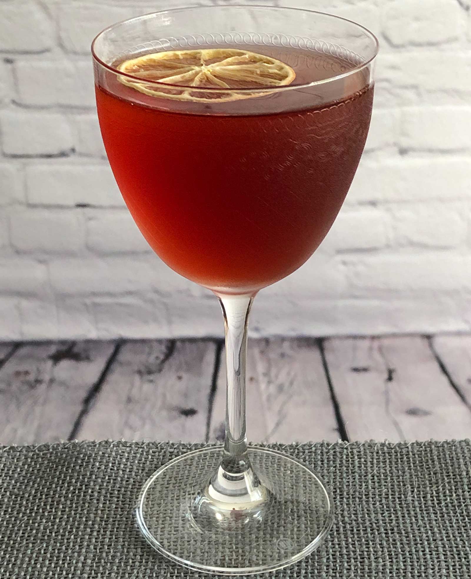 An example of the The Prime Directive no. 2, the mixed drink (cocktail) featuring Dolin Dry Vermouth de Chambéry, Salers Gentian Apéritif, and Byrrh Grand Quinquina; photo by Lee Edwards