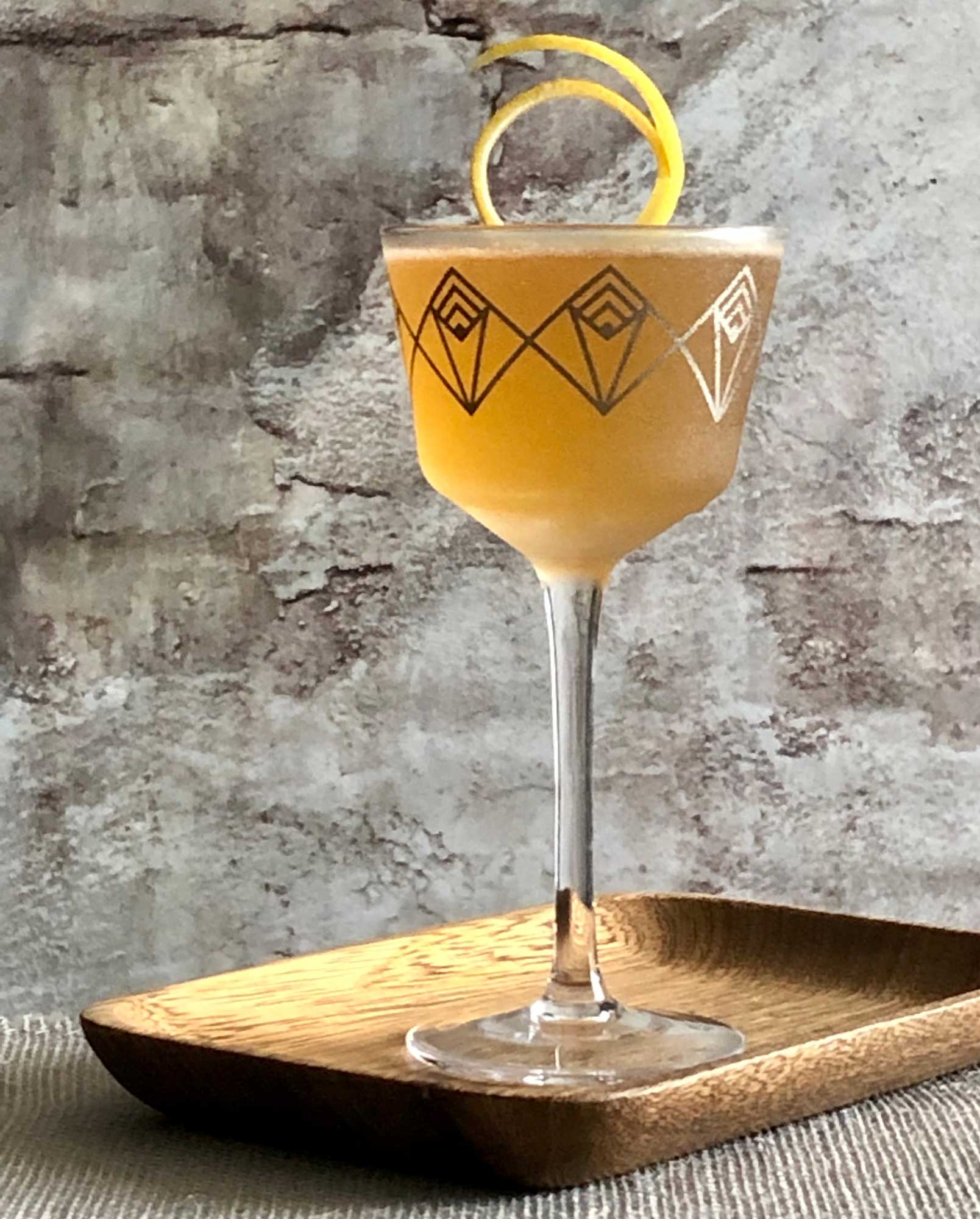 An example of the Leap Year, the mixed drink (cocktail), by Savoy Cocktail Book, featuring Hayman’s London Dry Gin, Cocchi Vermouth di Torino ‘Storico’, orange-flavored liqueur, and lemon juice; photo by Lee Edwards