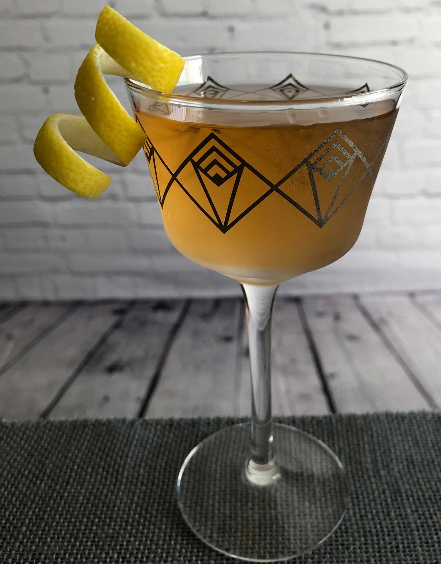 An example of the Prince Henry’s Reed, the mixed drink (cocktail) featuring Henriques & Henriques Rainwater Madeira, Dolin Dry Vermouth de Chambéry, and orange bitters; photo by Lee Edwards