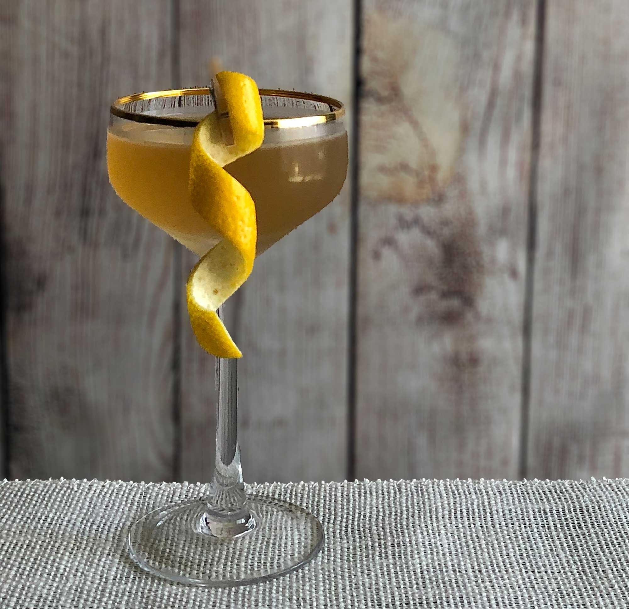 An example of the Royal Funchal Yacht Club, the mixed drink (cocktail), adapted from a recipe by Frederic Yarm, Royal Nine, Cambridge, Massachusetts, featuring Henriques & Henriques Rainwater Madeira, orange-flavored liqueur, John D. Taylor’s Velvet Falernum, lime juice, and simple syrup; photo by Lee Edwards