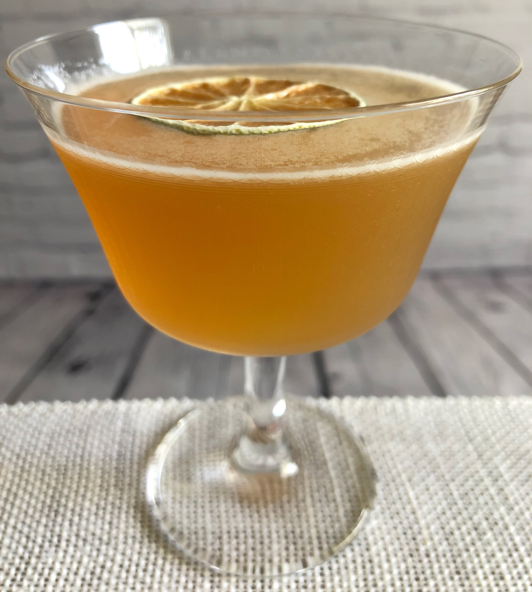 An example of the The Doctor, the mixed drink (cocktail) featuring Kronan Swedish Punsch, Smith & Cross Traditional Jamaica Rum, and lime juice; photo by Lee Edwards