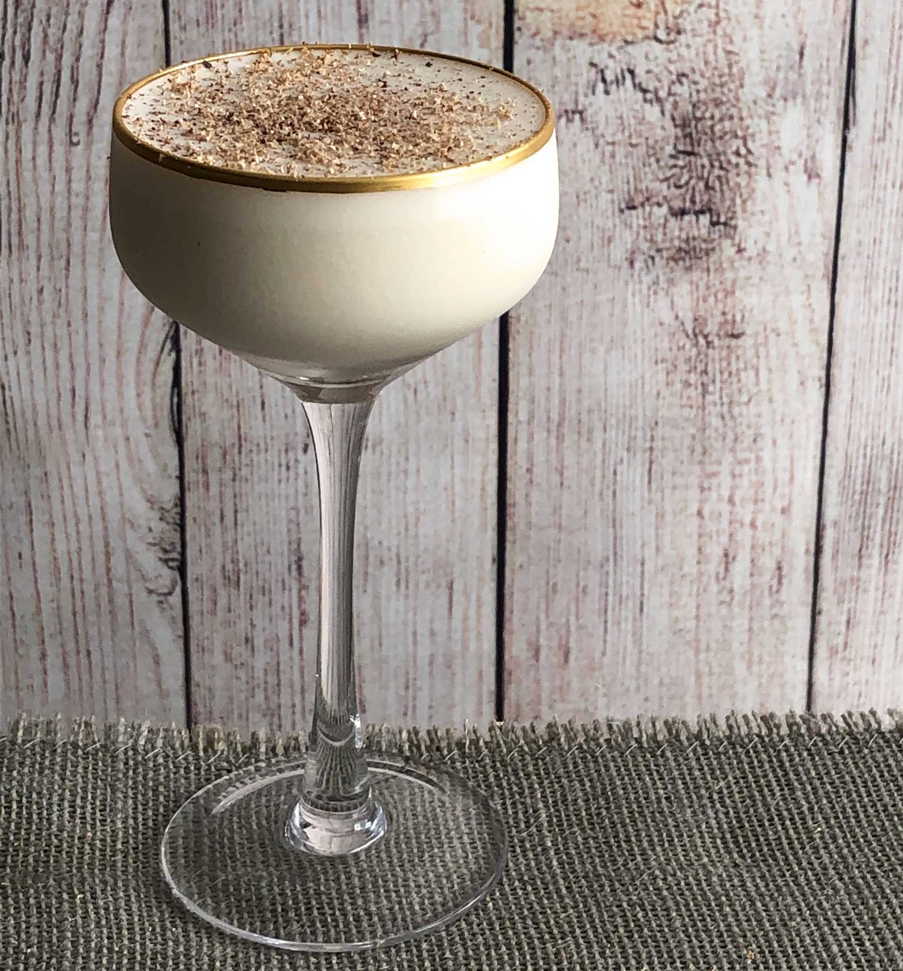 An example of the Barbary Coast, the mixed drink (cocktail), variation of a drink from the Savoy Cocktail Book, featuring Tresmontaine “tabacal” Rancio, Hayman’s London Dry Gin, crème de cacao (white), and cream; photo by Lee Edwards
