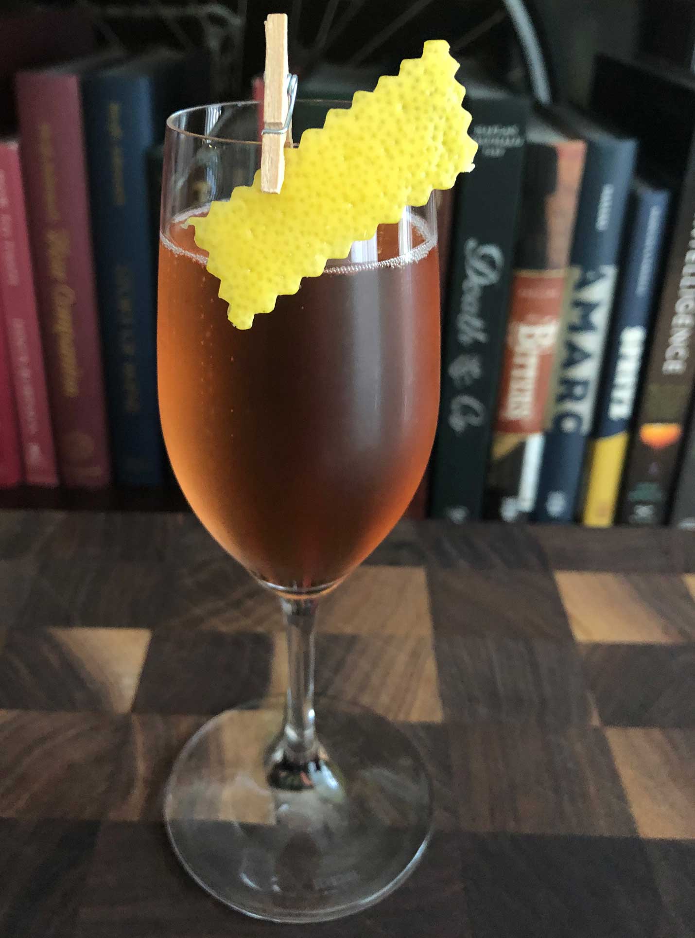 An example of the Inspector Clouseau, the mixed drink (cocktail) featuring sparkling wine, Dolin Blanc Vermouth de Chambéry, and Rothman & Winter Orchard Cherry Liqueur; photo by Lee Edwards