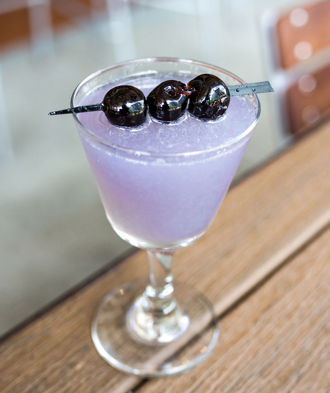 An example of the Aviation, the mixed drink (cocktail) featuring Hayman’s London Dry Gin, lemon juice, maraschino liqueur, and Rothman & Winter Crème de Violette; photo by Carolina Stamey, STIR, Chattanooga