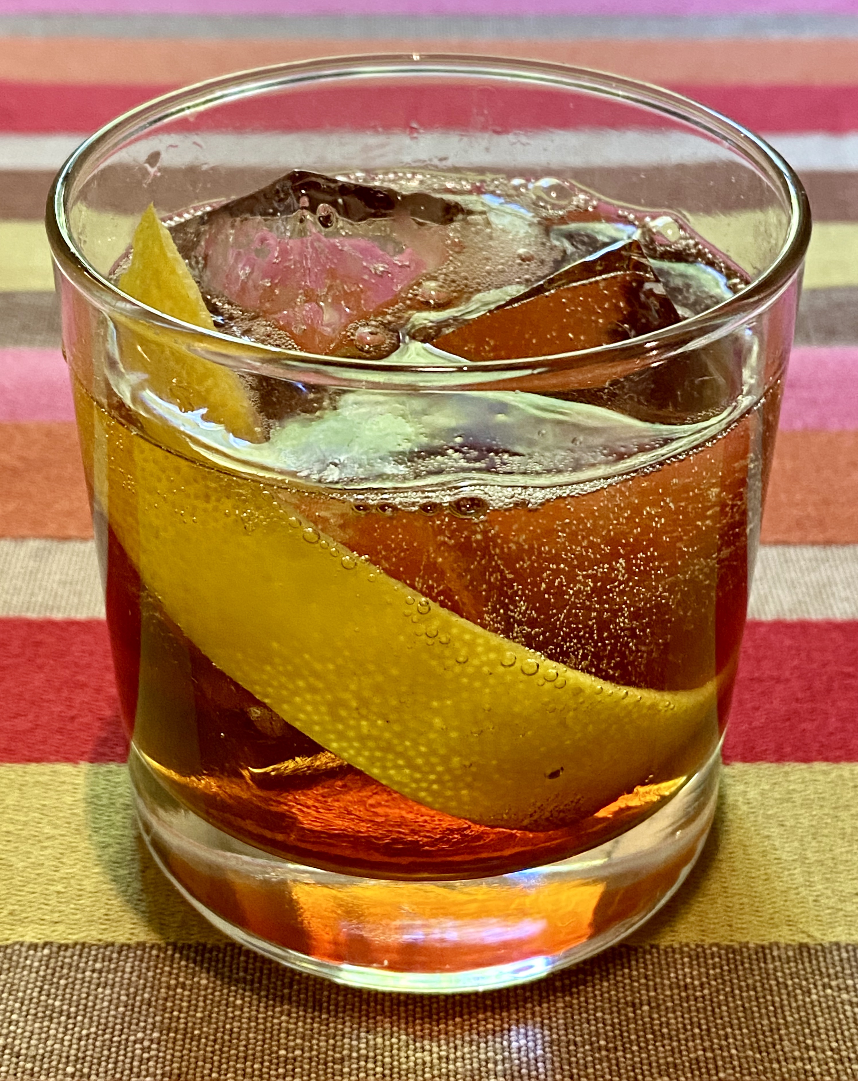 An example of the Mattei Rouge Spritz, the mixed drink (cocktail) featuring Mattei Cap Corse Rouge Quinquina, and soda water or tonic water; photo by Martin Doudoroff