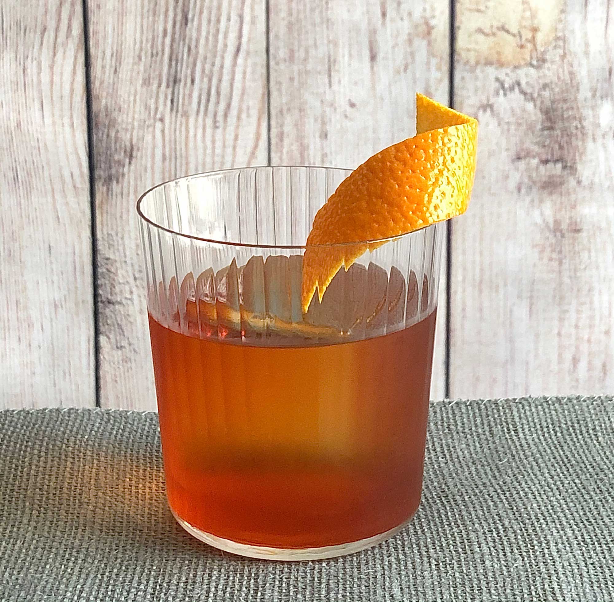 An example of the Boulevardier, the mixed drink (cocktail) featuring Mattei Cap Corse Rouge Quinquina, Aperitivo Cappelletti, and rye whiskey; photo by Lee Edwards