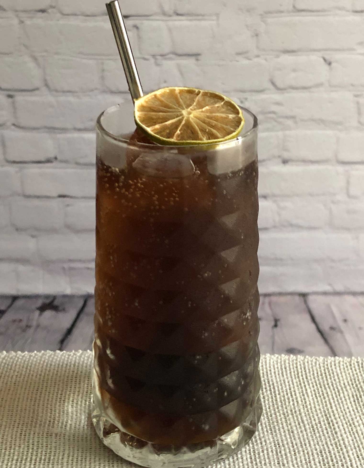 An example of the Cuba Libre, the mixed drink (cocktail) featuring cola, The Scarlet Ibis Trinidad Rum, and Angostura bitters; photo by Lee Edwards