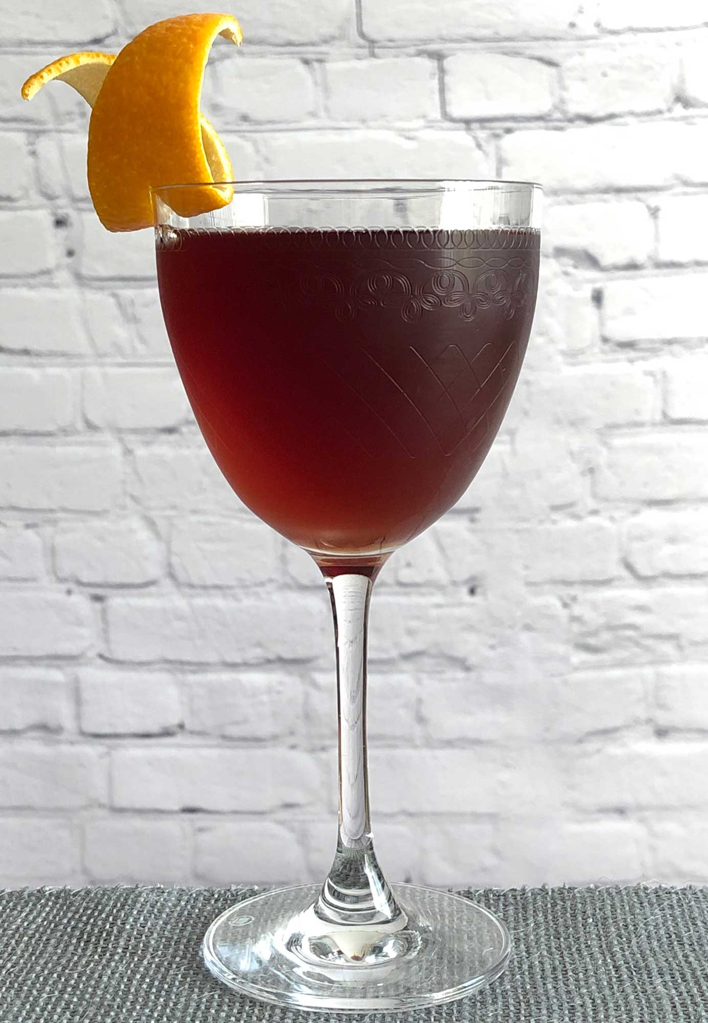 An example of the Dessert Manhattan, the mixed drink (cocktail) featuring bourbon whiskey, and Cocchi Dopo Teatro Vermouth Amaro; photo by Lee Edwards