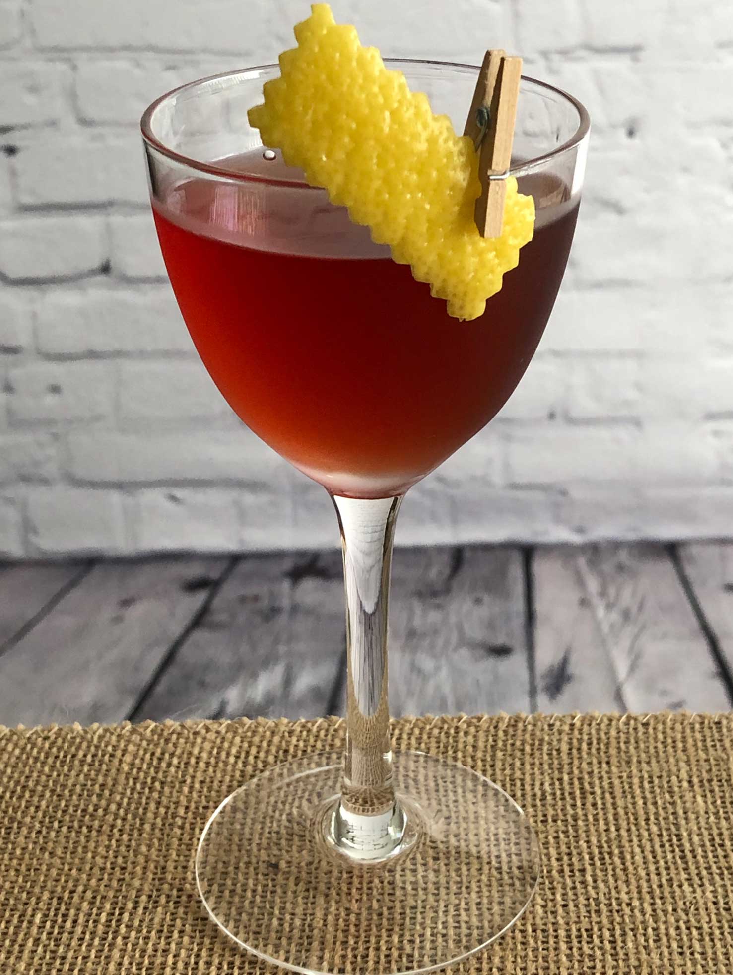 An example of the Cold Byrrrrh, the mixed drink (cocktail), by John Wabeck, Poulet Bleu and DeShantz, Pittsburgh, featuring Hayman’s London Dry Gin, Byrrh Grand Quinquina, and orange bitters; photo by Lee Edwards