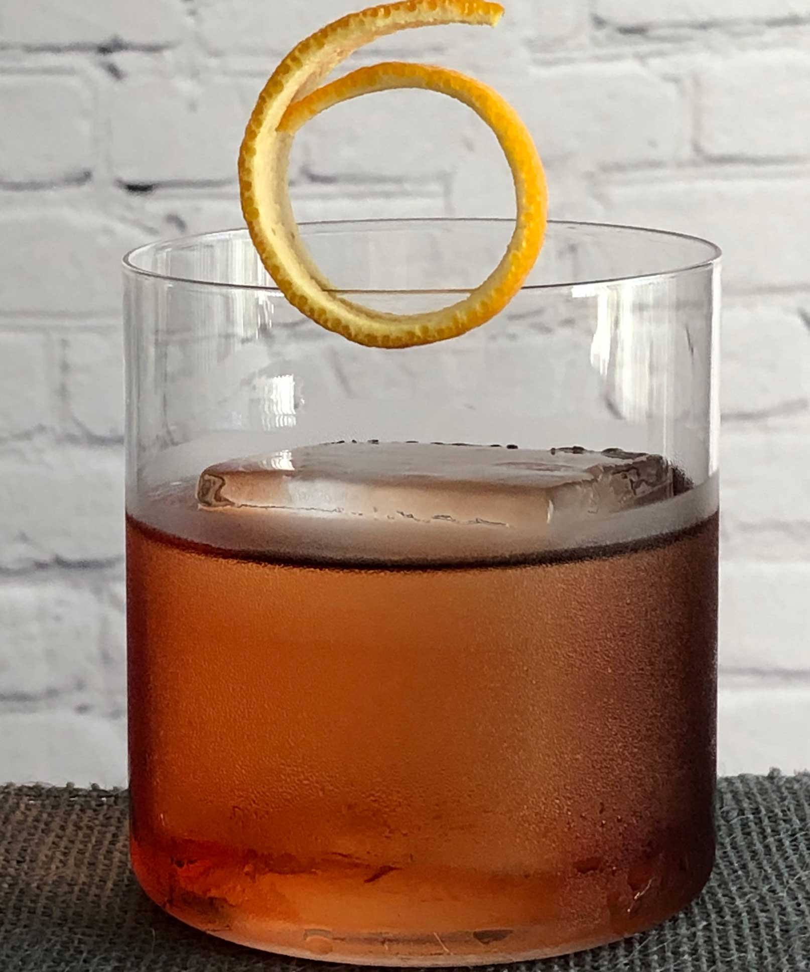 An example of the Crosstown Traffic, the mixed drink (cocktail) featuring Hayman’s London Dry Gin, Cardamaro Vino Amaro, and Cocchi Americano Rosa; photo by Lee Edwards