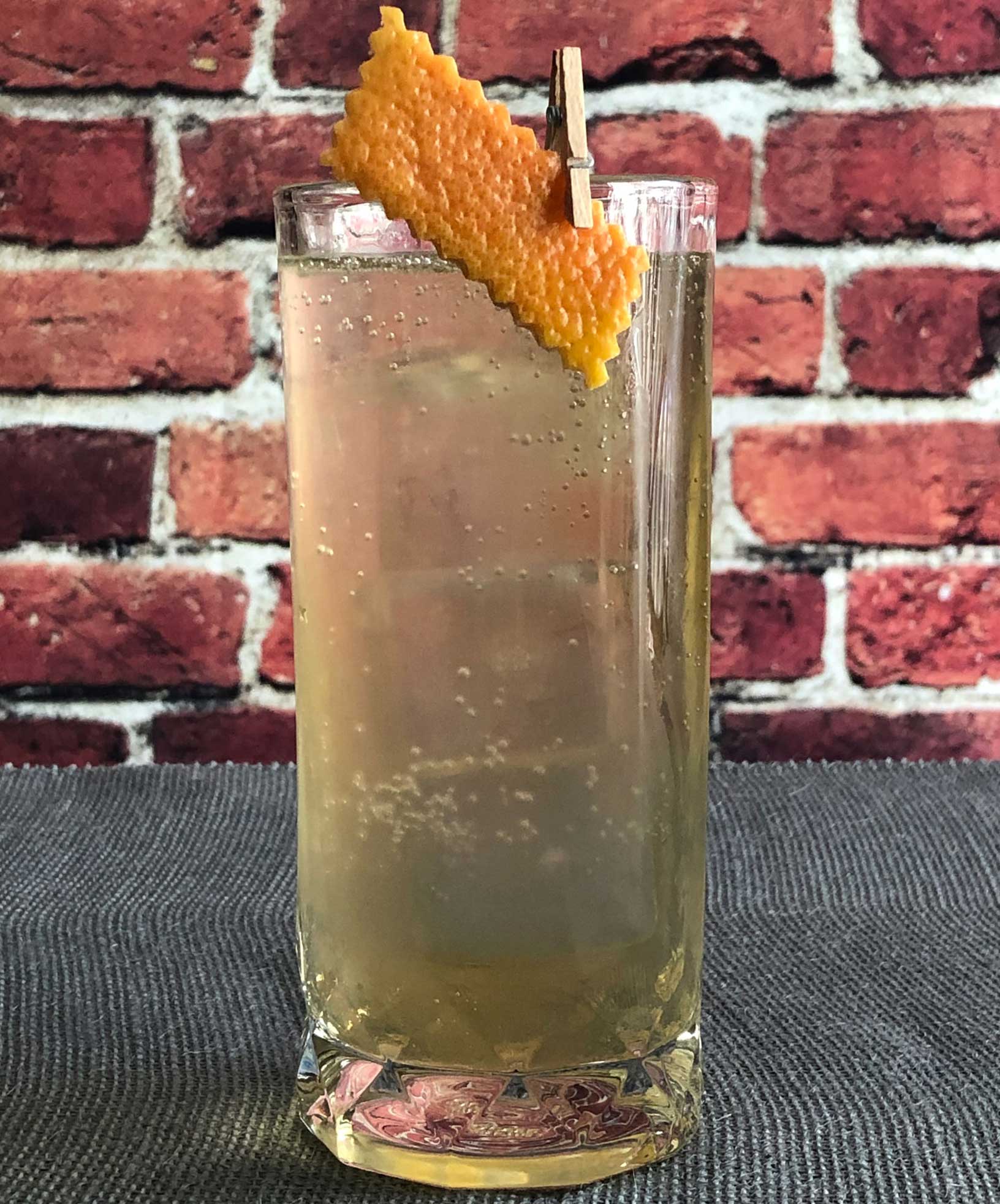 An example of the Salt of the Earth, the mixed drink (cocktail) featuring Fever Tree Indian Tonic Water, Amaro Alta Verde, and Mattei Cap Corse Blanc Quinquina; photo by Lee Edwards