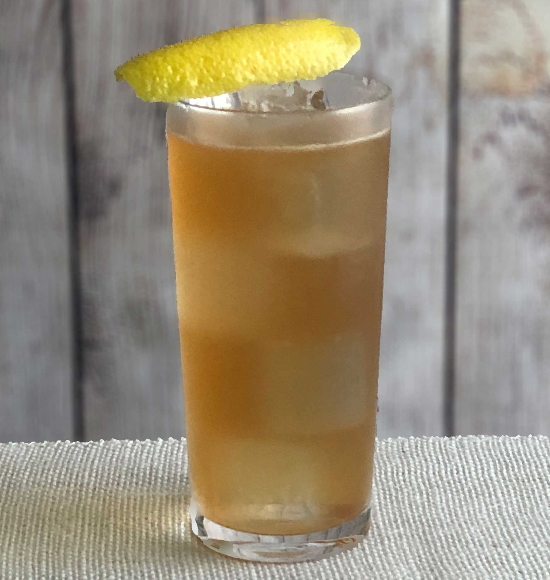 An example of the Service Station Sling, the mixed drink (sling) featuring soda water, blended scotch whisky, Mattei Cap Corse Rouge Quinquina, simple syrup, and lemon juice; photo by Lee Edwards