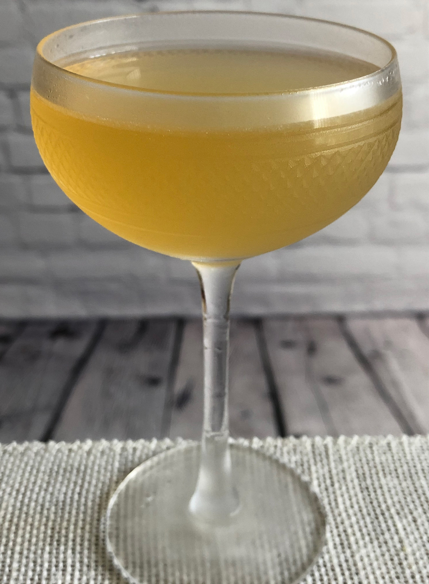 An example of the The Good Word, the mixed drink (cocktail), by Kelly O’Hare, Austin, TX, featuring Smith & Cross Traditional Jamaica Rum, Bénédictine, Amaro Alta Verde, and lime juice; photo by Lee Edwards