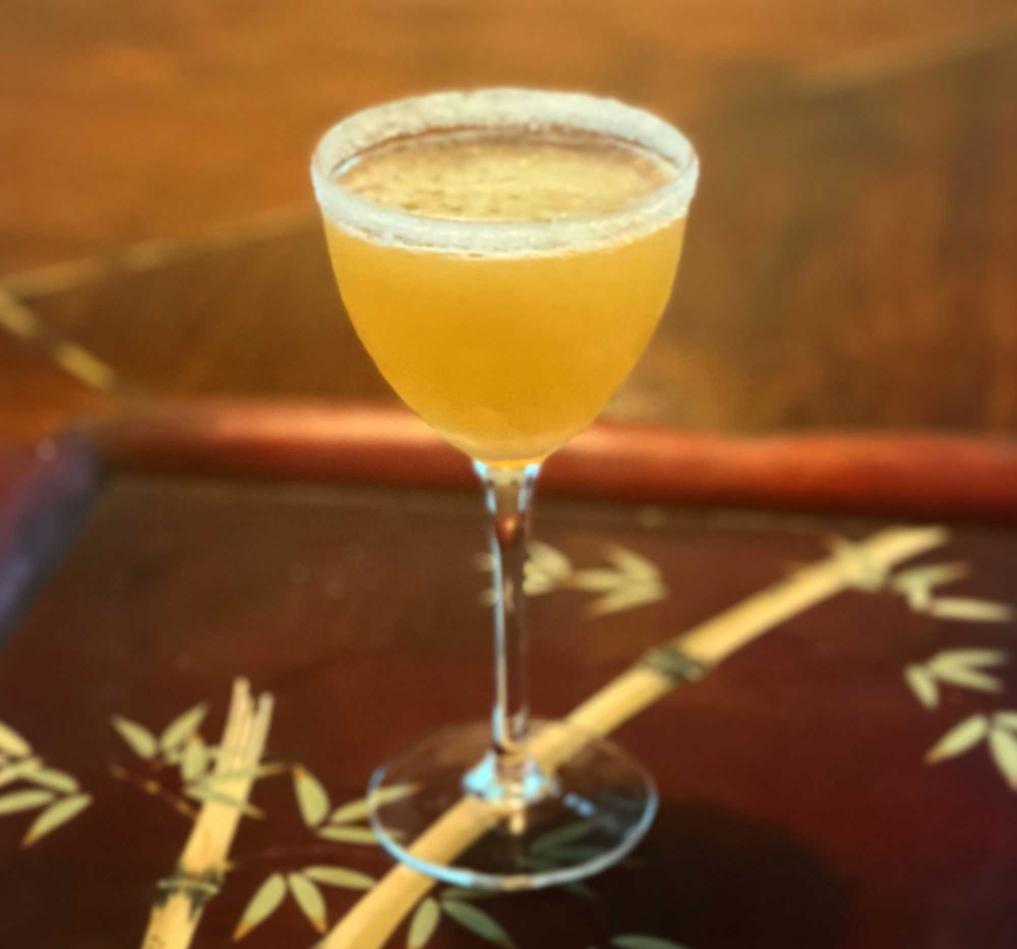 An example of the Almond Blossom Crusta, the mixed drink (crusta), by Charles Baker, 1951, featuring cognac, Hayman’s London Dry Gin, lime juice, and orgeat; photo by Thierry Morpurgo