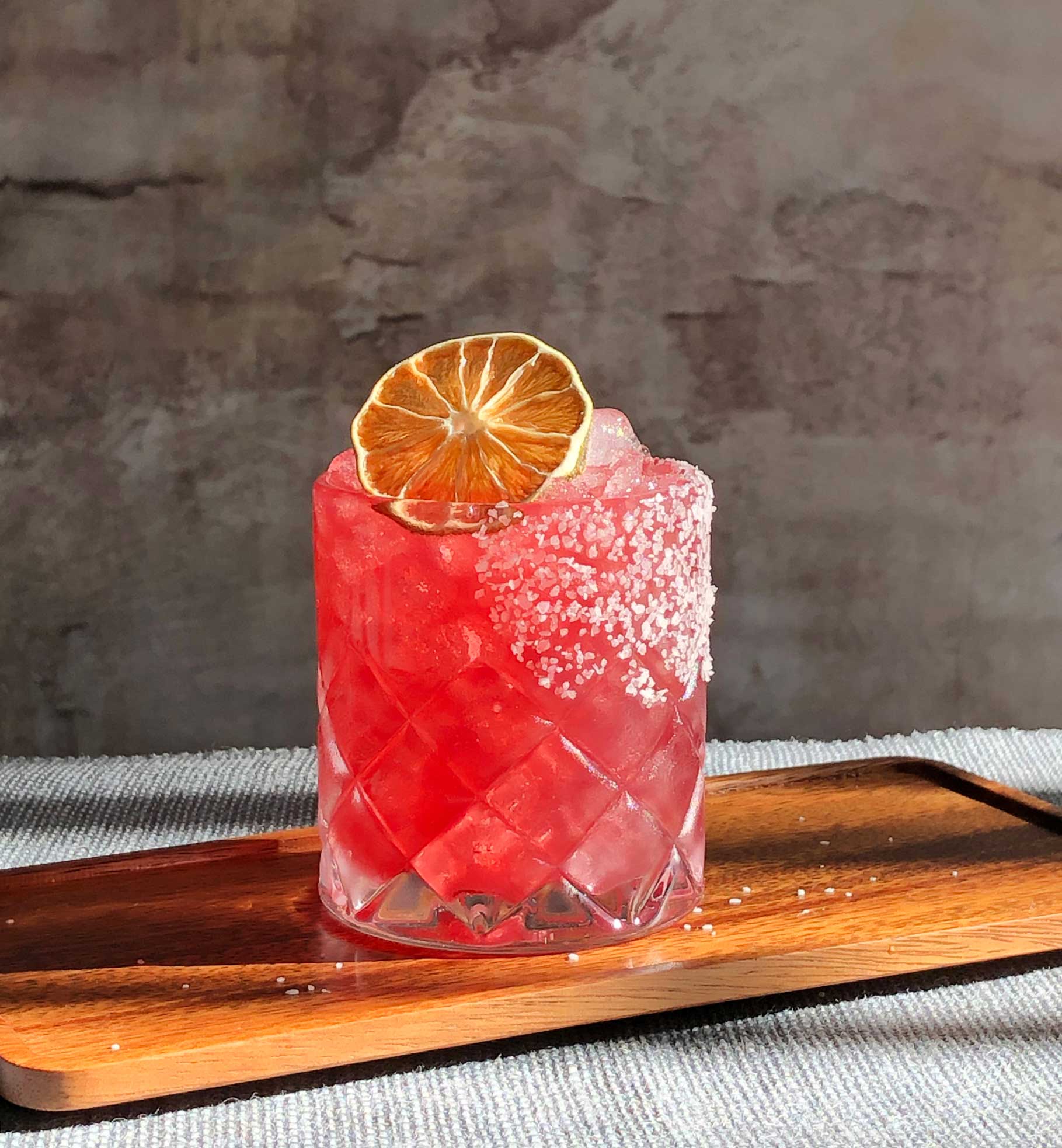 An example of the Elderberry Margarita, the mixed drink (cocktail) featuring reposado tequila, lime juice, Rothman & Winter Orchard Elderberry Liqueur, and rich simple syrup; photo by Lee Edwards